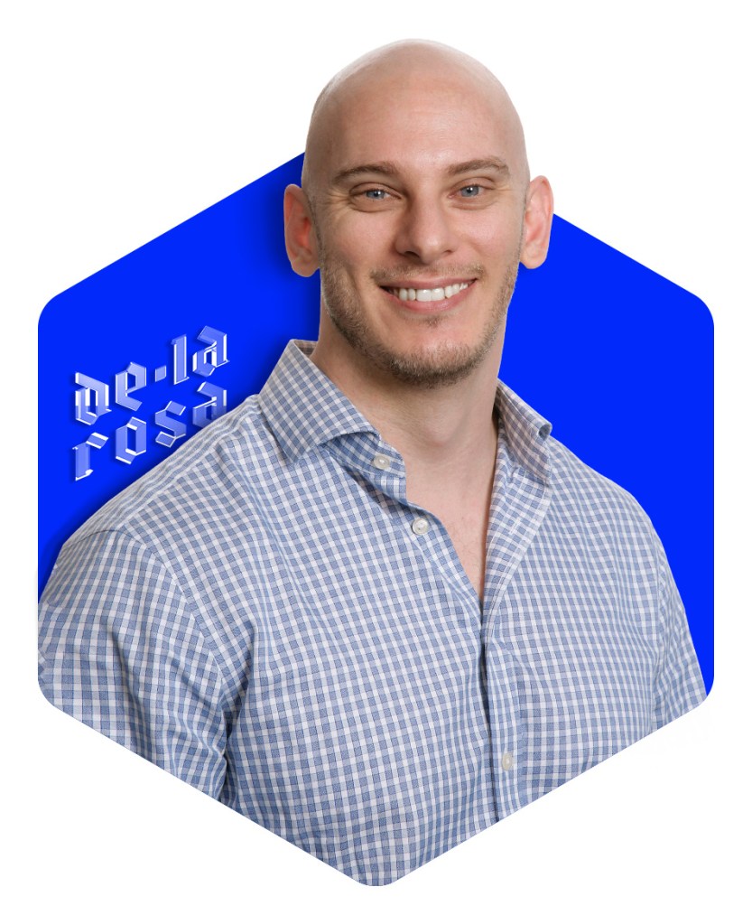 Portrait of Scott de la Rosa on a vibrant blue hexagon background